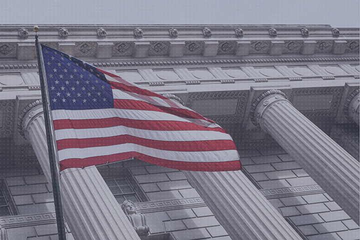 american flag in front of building