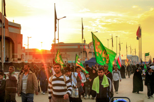 people walking on street for Karbala pilgrimage