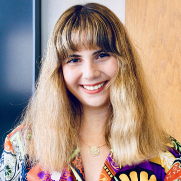 Headshot of Nilsu Celikel smiling